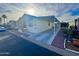 Light-colored manufactured home with carport and landscaping at 9333 E University Dr # 51, Mesa, AZ 85207