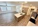 Open kitchen with island and stainless steel appliances at 9333 E University Dr # 51, Mesa, AZ 85207