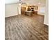 Open kitchen with island, stainless steel appliances, and light wood cabinets at 9333 E University Dr # 51, Mesa, AZ 85207