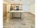 Open kitchen with island and stainless steel appliances at 9333 E University Dr # 51, Mesa, AZ 85207