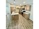 Open kitchen with island and stainless steel appliances at 9333 E University Dr # 51, Mesa, AZ 85207