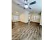 Spacious living room with wood-look flooring and neutral color palette at 9333 E University Dr # 51, Mesa, AZ 85207