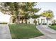 Elegant one-story home nestled on a manicured lawn at 9440 N 57Th St, Paradise Valley, AZ 85253