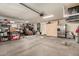 Garage with overhead storage and ample space for vehicles at 1285 E Palo Verde St, Gilbert, AZ 85296