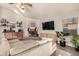 Relaxing living room with sectional sofa, fireplace, and built-in shelving at 1285 E Palo Verde St, Gilbert, AZ 85296