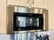 Stainless steel over-the-range microwave with various cooking options at 13640 W Paso Trl, Peoria, AZ 85383