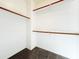 Large walk-in closet with double hanging rods at 13779 W Mauna Loa Ln, Surprise, AZ 85379