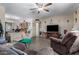 Spacious living room with ample seating and a view of the dining area at 1472 S Ocotillo Dr, Apache Junction, AZ 85120