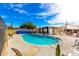 Community pool with plenty of lounge chairs at 1472 S Ocotillo Dr, Apache Junction, AZ 85120