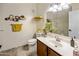 Clean bathroom with single vanity and shower/tub combo at 15050 N Thompson Peak Pkwy # 2053, Scottsdale, AZ 85260