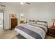 Comfortable bedroom with king-size bed and ensuite bathroom access at 15050 N Thompson Peak Pkwy # 2053, Scottsdale, AZ 85260