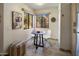 Cozy breakfast nook with a round table and white chairs near a window at 15050 N Thompson Peak Pkwy # 2053, Scottsdale, AZ 85260
