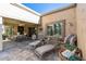 Spacious patio with lounge chairs and dining furniture at 19236 N 93Rd N Ave, Peoria, AZ 85382