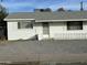 Front view of a charming single story home at 2127 E Bayberry Ave, Mesa, AZ 85204