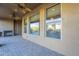 Covered patio with fireplace and ceiling fans at 25803 N 8Th Ave, Phoenix, AZ 85085