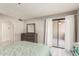 Bedroom with patio access and built-in dresser at 3031 N Civic Center Plz # 224, Scottsdale, AZ 85251