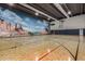 Indoor basketball court with a scenic mural at 3031 N Civic Center Plz # 224, Scottsdale, AZ 85251