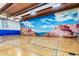 Community room with basketball court and mural at 3031 N Civic Center Plz # 224, Scottsdale, AZ 85251