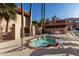 Community spa with lounge chairs and patio tables at 3031 N Civic Center Plz # 224, Scottsdale, AZ 85251