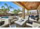 Covered patio with seating area overlooking the pool at 3937 E Taurus Pl, Chandler, AZ 85249