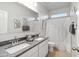Bathroom with double vanity and shower/tub combo at 40030 W Venture Rd, Maricopa, AZ 85138