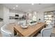 Kitchen features a large island and an adjacent dining area at 40030 W Venture Rd, Maricopa, AZ 85138