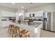 Modern kitchen with island, stainless steel appliances, and granite countertops at 40030 W Venture Rd, Maricopa, AZ 85138