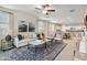Open concept living room with kitchen and dining area visible at 40030 W Venture Rd, Maricopa, AZ 85138