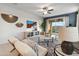 Living room with a view of the backyard and comfortable seating at 40030 W Venture Rd, Maricopa, AZ 85138
