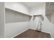 Large walk-in closet with double hanging rods and shelving at 40030 W Venture Rd, Maricopa, AZ 85138