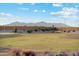 Expansive grassy area with a sprinkler system at 40080 W Venture Rd, Maricopa, AZ 85138