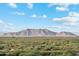 Stunning desert landscape with mountain views and shrubbery at 40080 W Venture Rd, Maricopa, AZ 85138