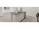 Kitchen island with granite countertop and stainless steel sink at 40080 W Venture Rd, Maricopa, AZ 85138