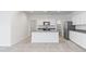 Open kitchen with island and granite countertops at 40080 W Venture Rd, Maricopa, AZ 85138