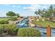Landscaped waterfall feature with lush greenery at 40080 W Venture Rd, Maricopa, AZ 85138