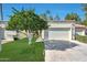 Charming home with two-car garage and well-manicured lawn at 604 S Palo Verde Way, Mesa, AZ 85208