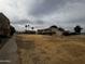 View of the community with grassy areas and buildings at 6338 N 47Th Ave, Glendale, AZ 85301