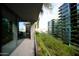 Private balcony overlooking a lush courtyard at 7120 E Kierland Blvd # 520, Scottsdale, AZ 85254