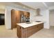 Modern kitchen with stainless steel appliances and light wood cabinets at 7120 E Kierland Blvd # 520, Scottsdale, AZ 85254