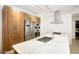 Modern kitchen with stainless steel appliances and light wood cabinets at 7120 E Kierland Blvd # 520, Scottsdale, AZ 85254