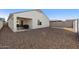 Landscaped backyard with gravel and covered patio at 738 W Jardin Dr, Casa Grande, AZ 85122