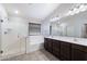 Bathroom features double sinks, soaking tub and shower at 738 W Jardin Dr, Casa Grande, AZ 85122