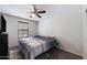 Bedroom with ceiling fan and neutral decor at 738 W Jardin Dr, Casa Grande, AZ 85122