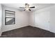Bedroom with ceiling fan and double door closet at 738 W Jardin Dr, Casa Grande, AZ 85122