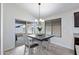 Kitchen dining area with window and sliding door to backyard at 738 W Jardin Dr, Casa Grande, AZ 85122