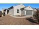 Single-story home with a two-car garage and desert landscaping at 738 W Jardin Dr, Casa Grande, AZ 85122