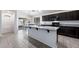 Kitchen with island, granite countertops, and dark cabinets at 738 W Jardin Dr, Casa Grande, AZ 85122