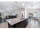 Kitchen with island, granite countertops, and breakfast area at 738 W Jardin Dr, Casa Grande, AZ 85122