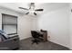 Home office with ceiling fan and comfortable seating at 738 W Jardin Dr, Casa Grande, AZ 85122