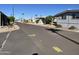 Community street view showing multiple manufactured homes at 8600 E Broadway Rd # 9, Mesa, AZ 85208